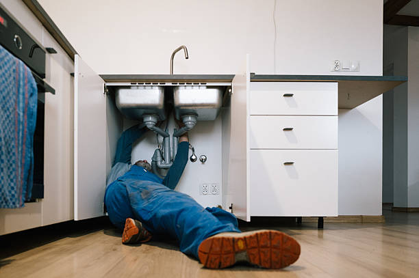 Professional Drain Cleaning technician working in DeKalb, IL